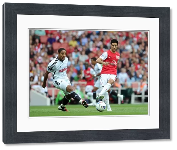 Mikel Arteta (Arsenal) Ashley Williams (Swansea). Arsenal 1: 0 Swansea City