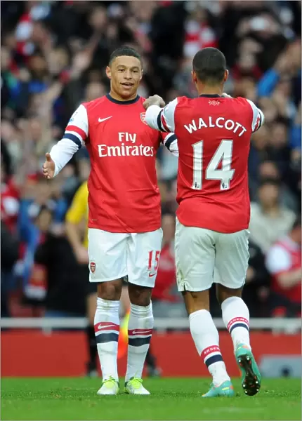 Arsenal's Double Act: Walcott and Oxlade-Chamberlain Celebrate Goal Against Tottenham (2012-13)