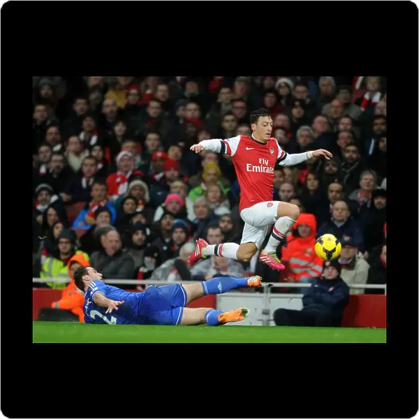 Mesut Ozil Evades Branislav Ivanovic: Intense Moment from the Arsenal vs Chelsea Clash (2013-14)