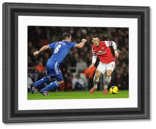Mesut Ozil vs. Frank Lampard: A Premier League Rivalry - Arsenal vs. Chelsea (2013-14): Clash of Midfield Maestros