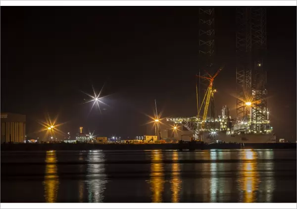 A night-time view of the fabrication yard at Nigg Point in Scotland