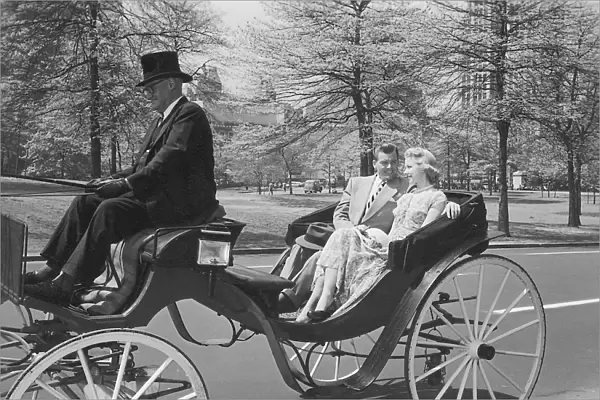 Couple enjoying a carriage ride