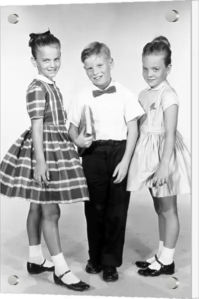 Portrait of three school children