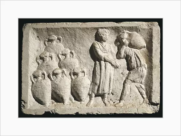 Relief depicting people carrying amphorae in wine cellar