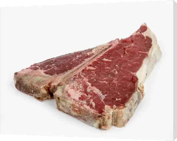 T-bone steak against white background