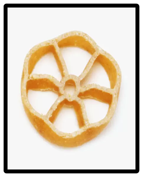Wheel shaped brown pasta