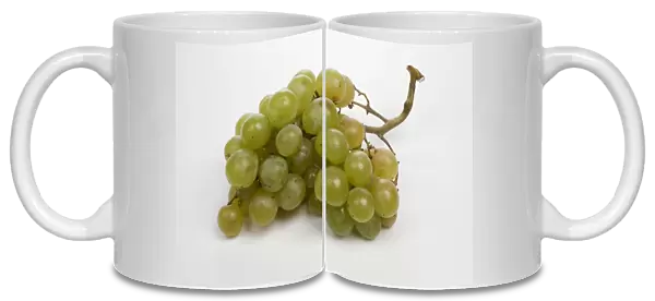 Bunch of moscatel grapes against white background