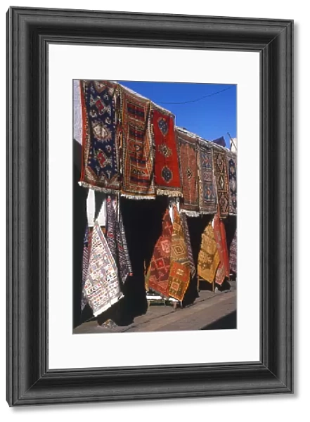 Morocco, Casablanca, Quartier Habous (New Medina), Moroccan carpets displayed for sale