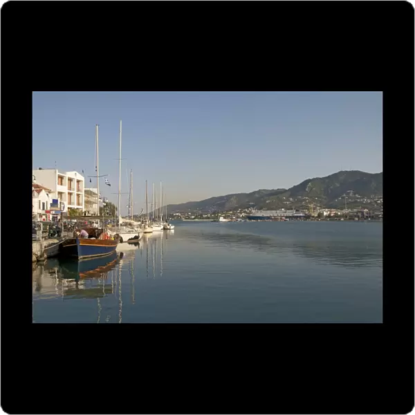 Greece, Lesbos island, Mytilene town, boats with tall masts moored at the harbour