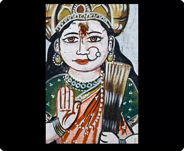 Portrait of goddess Parvati (spouse of Shiva) on a wall in Varanasi