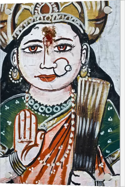 Portrait of goddess Parvati (spouse of Shiva) on a wall in Varanasi