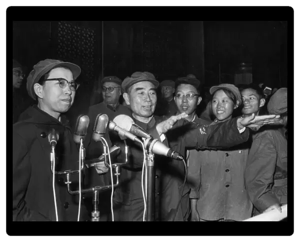 Jiang qing (mme, mao) and zhou enlai greeting the 500, 000 red guards, revolutionary teachers and students at a massive rally in tienanmen square in beijing on august 31, 1966