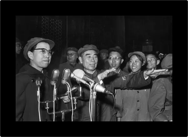 Jiang qing (mme, mao) and zhou enlai greeting the 500, 000 red guards, revolutionary teachers and students at a massive rally in tienanmen square in beijing on august 31, 1966