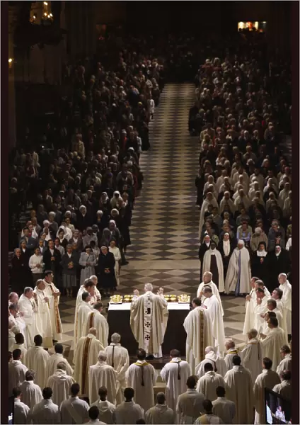 Easter week celebration (Chrism mass) in Notre Dame Cathedral. Eucharist