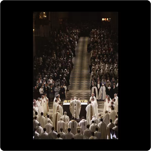 Easter week celebration (Chrism mass) in Notre Dame Cathedral. Eucharist