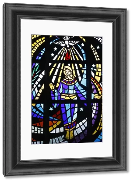 Holy ghost & Virgin Mary depicted on stained glass