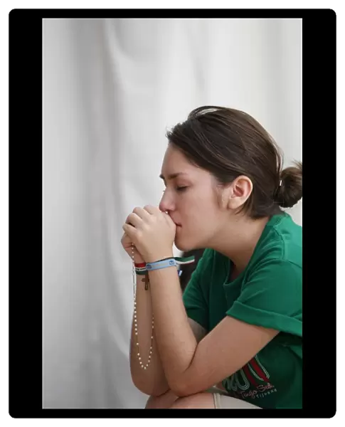 Praying pilgrim at World Youth Day