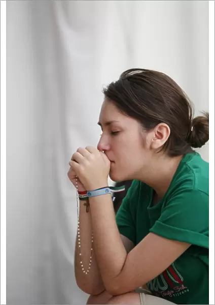 Praying pilgrim at World Youth Day