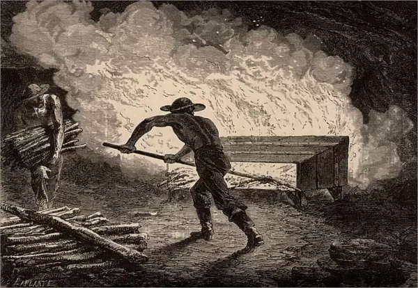 Miners breaking up rock by setting a fire on it. When the rock cooled it would crack