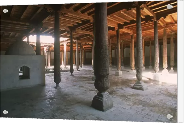 Uzbekistan, Khiva, Itchan Kala, columns in Kutlug Murad Inak Madrasah