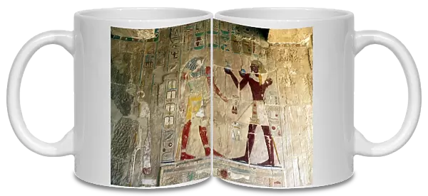 Hatshepsut (1540ja-1481jaBC) Queen of Egypt, presents offerings to the falcon-headed god Horus