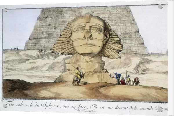 Huge head of Sphinx, seen from the front. It is just in front of the second pyramid of Memphis
