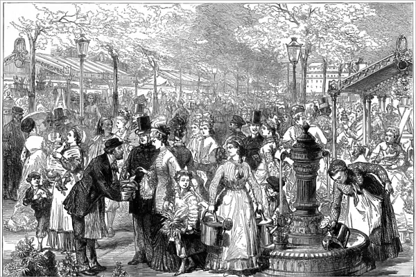 New Flower Market, Paris. Flower sellers filling their water cans at the fountain