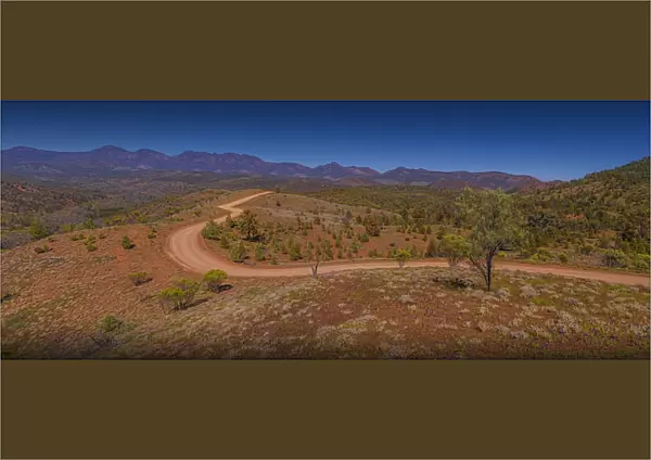 The gravel road winds through the Bunyeroo Valey in the Flinders Ranges national park, South Australia