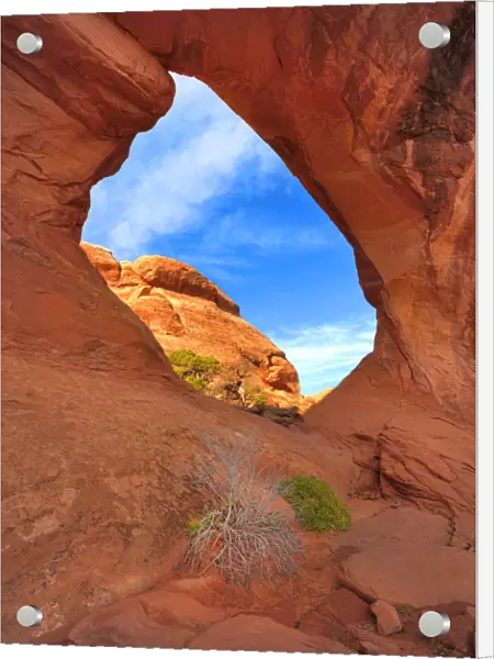Looking through Double O Arch in the Arches National Park, Utah