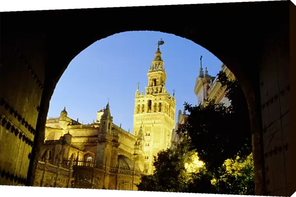 Spain, Andalucia, Seville, cathedral exterior, low angle view, dusk