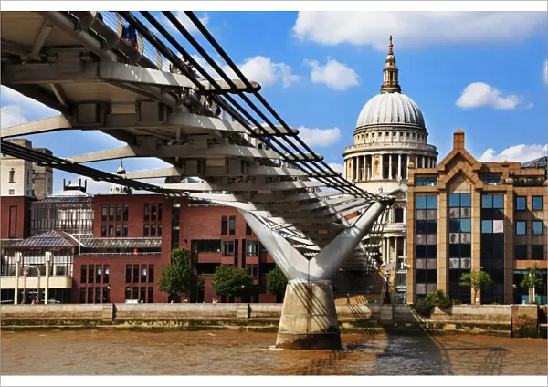 View of St Pauls Cathedral and the Millennium Bridge at River Thames, London, England