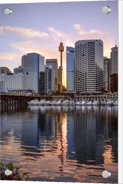 Sunrise View of Cockle Bay Wharf in Darling Harbour and Sydney Tower Eye, New South Wales, Australia