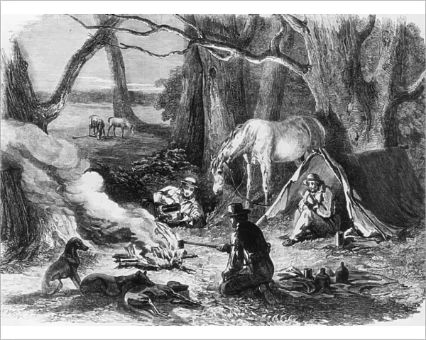 Bush Camp. 20th April 1850: Australians rest around their campfire in the Australian bush