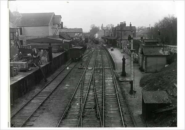 View west from South Road at Saffron Walden Station. Unloading bank on left run-round loop centre