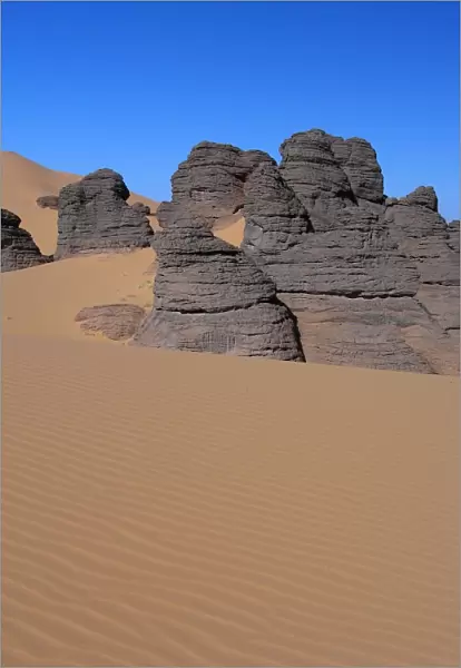 Rock formations in the sand of the Sahara