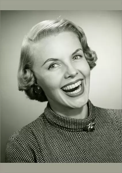 Laughing woman posing in studio, (B&W), portrait, close-up