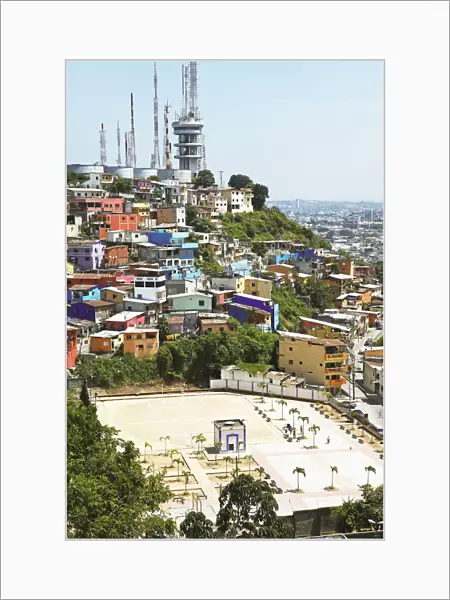 Sports ground, colourful houses and radio masts on Cerro del Carmen, Guayaquil, Guayas Province, Ecuador