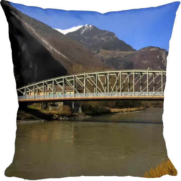 Broadside of a steel bridge crossing Rhone River, near Chessel, Vaud, Switzerland, Europe