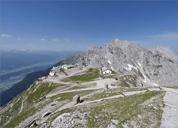 View down from the 2334m high Hafelekarspitze Mountain towards the Hafelekar mountain station and Seegrube Mountain, including the Inn Valley, Tyrol, Austria, Europe