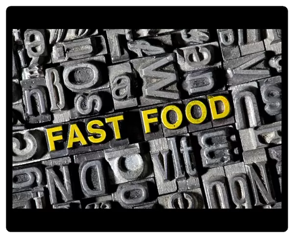 Old lead letters forming the word fast food