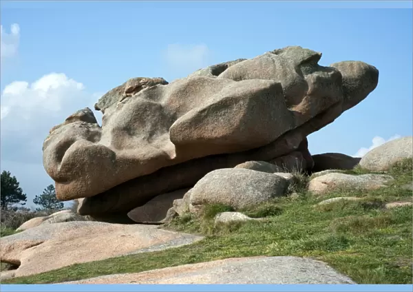 Large boulder lying diagonally on a slope, Cote de Granit Rose, Brittany, France, Europe
