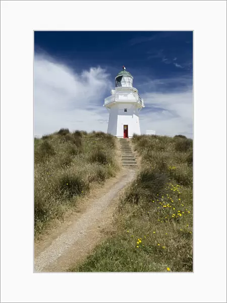Lighthouse with path and stairs at Waipapa Point, Otara, Fortrose, Southland Region, South Island, New Zealand