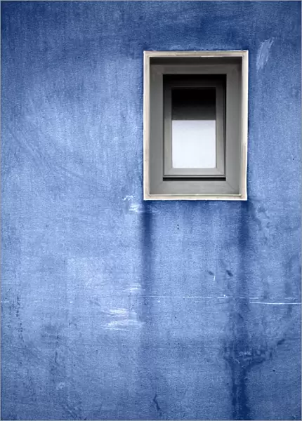 Blue wall with a window