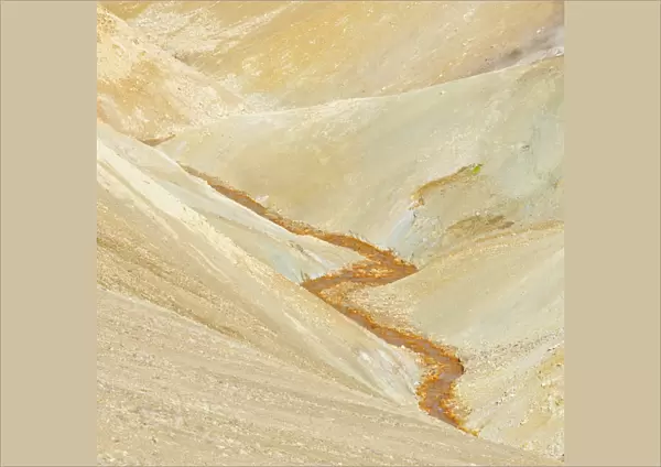 Stream bed coloured by iron oxide, Landmannalaugar, Southern Region, Iceland