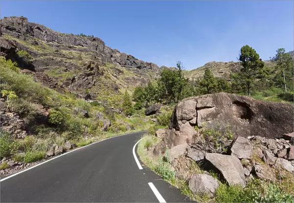 Mountain chain and a country road, El Pie de la Cuesta, Roque Bentaiga, Gran Canaria, Canary Islands, Spain, Europe, PublicGround
