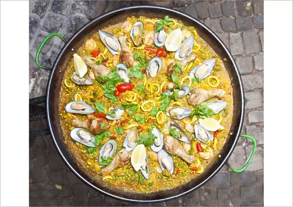 Paella, a Spanish rice dish with seafood and chicken, series, no. 7