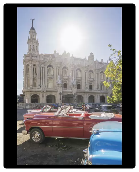 Vintage cars in front of Havana?s National Theater