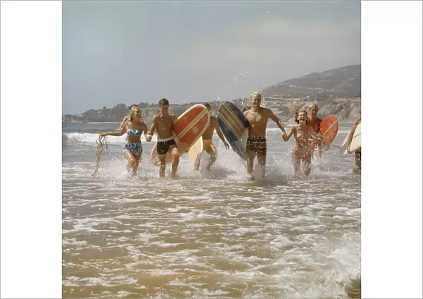 1960s Surfers Running in the Water
