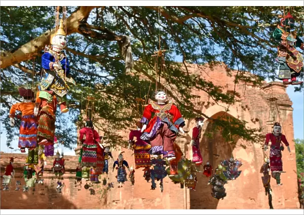 Suspend dolls from tree at Dhamma Yan Gyi Temple, Bagan, unesco ruins Myanmar. Asia