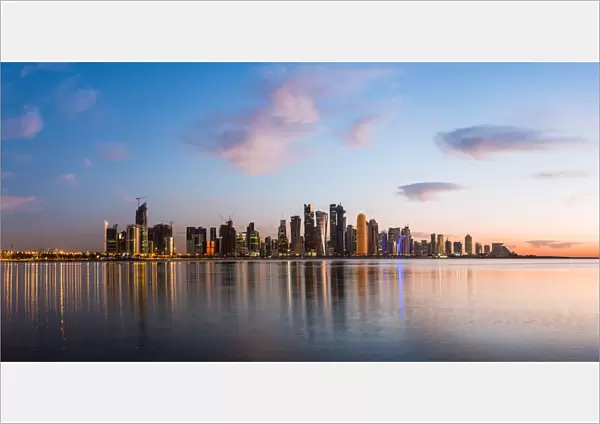Qatar, Doha. Cityscape at sunrise from the Corniche